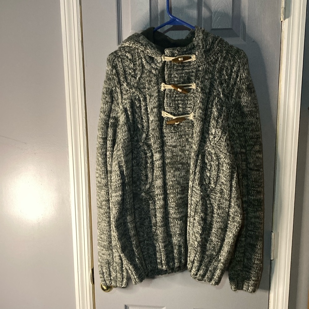 Slightly used men sweater with hood